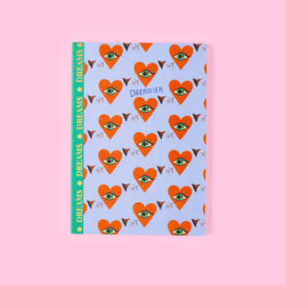 Eleanor Bowmer notebook with heart and eye pattern on a pink background