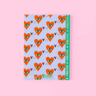 Eleanor Bowmer notebook back with heart and eye pattern on a pink background