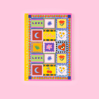 Colourful patchwork design Eleanor Bowmer notebook with love symbols on a pink background