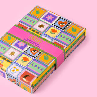 Colourful Eleanor Bowmer keepsake notebook box with patchwork 'love' and floral patterns on a pink background