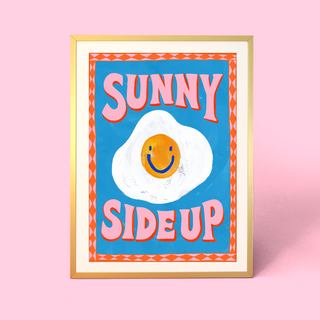 Eleanor Bowmer artwork with a smiley face fried egg and 'Sunny Side Up' text