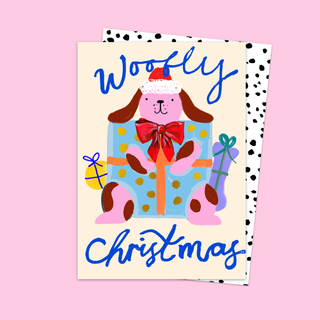 Christmas card with a dog illustration and 'Woofly Christmas' text.